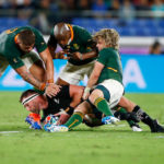 Springboks Malcolm Marx and Makazole Mapimpi and Faf de Klerk tackling Kieran Read