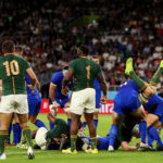 Duane Vermeulen is spear tackled by the Italian props