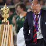 Eddie Jones walks past the Webb Ellis Cup after the final/AP