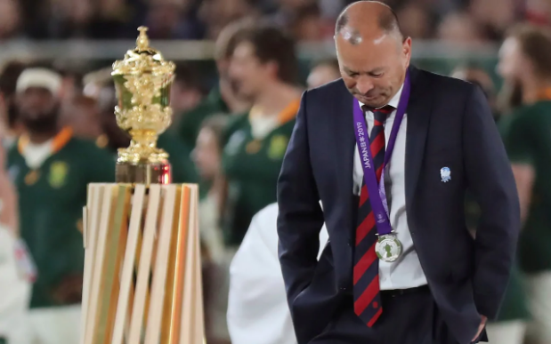 Eddie Jones walks past the Webb Ellis Cup after the final/AP