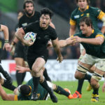 Nehe Milner-Skudder of the New Zealand All Blacks is tackled by Eben Etzebeth of South Africa during the 2015 Rugby World Cup Semi Final match between South Africa and New Zealand at Twickenham