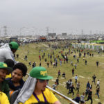 Residents of Langa pursue the Springbok bus