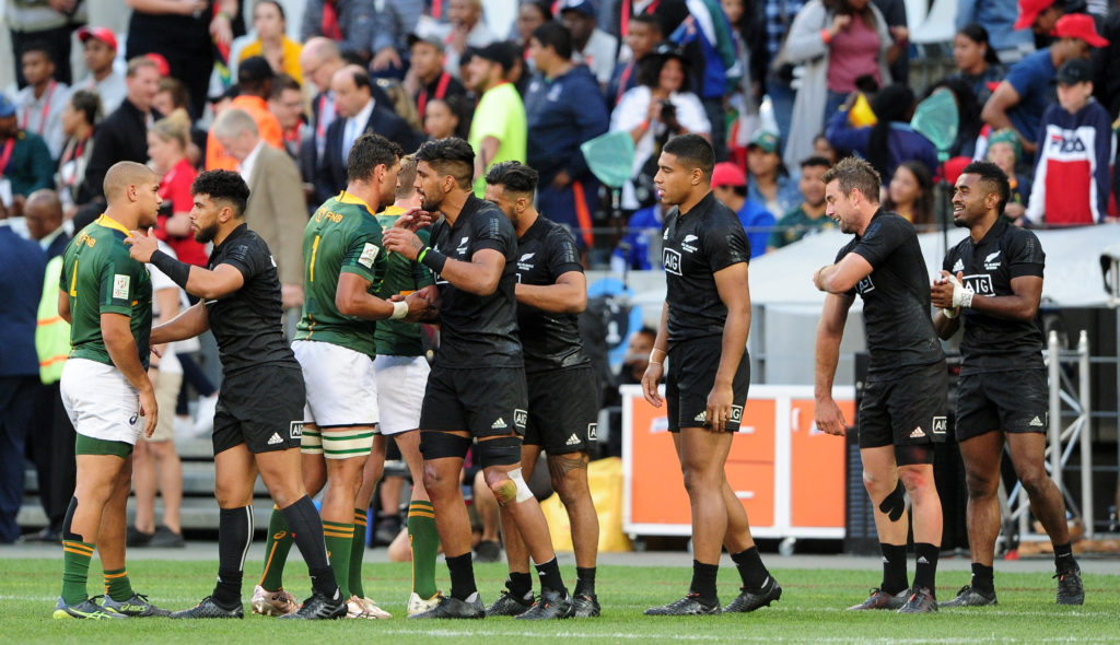 New Zealand and the Blitzboks shake hands at the Cape Town Sevens