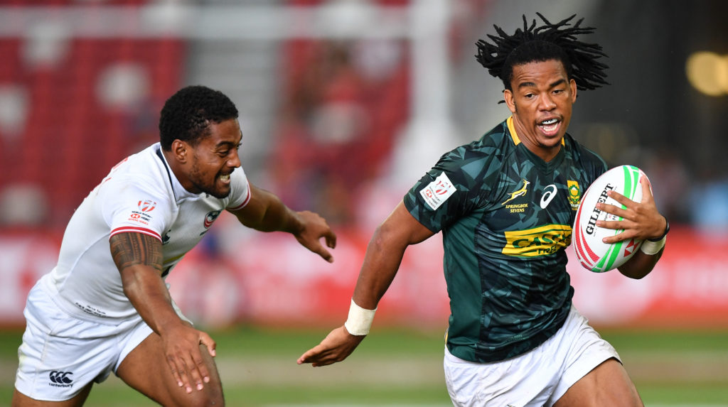 Stedman Gans of South Africa (R) and Marcus Tupuola of USA (L) in actions during the Cup Semi Finals between South Africa and USA