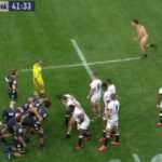 Watch: Streaker interrupts play