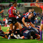 The Rebels celebrate against the Lions