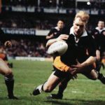 George Gregan tackles Jeff Wilson