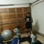 Watch: Elton dances with sons