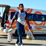 Siya Kolisi hands_out_food_parcels