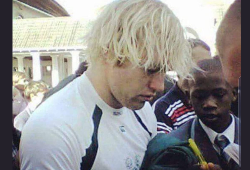 Schalk Burger and a young Siya Kolisi at a signing session