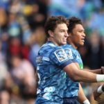 AUCKLAND, NEW ZEALAND - JUNE 14: Beauden Barrett of the Blues congratulates Caleb Clarke on his try during the round 1 Super Rugby Aotearoa match between the Blues and the Hurricanes at Eden Park on June 14, 2020 in Auckland, New Zealand. (Photo by Phil Walter/Getty Images)