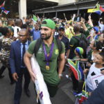 epa07974744 South African supporters welcome South African rugby player Damian de Allende (C) at O.R.Tambo International airport as some of the national rugby team known as the Springboks arrive from Japan after winning the Rugby World Cup, Johannesburg, South Africa 05 November 2019. South Africa won the Webb Ellis trophy after defeating England 32-12 in the Rugby World Cup final played in Japan on 02 November 2019. EPA/STR