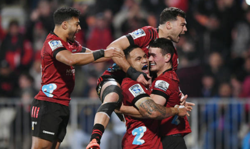 The Crusaders celebrate Will Jordan's try