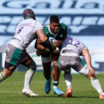 Shaun Adendorff makes a tackle on debut for the Northampton Saints