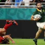 KOBE, JAPAN - OCTOBER 08: Cobus Reinach of South Africa breaks away from Jeff Hassler of Canada to score his team's third try during the Rugby World Cup 2019 Group B game between South Africa and Canada at Kobe Misaki Stadium on October 08, 2019 in Kobe, Hyogo, Japan. (Photo by Mike Hewitt/Getty Images)