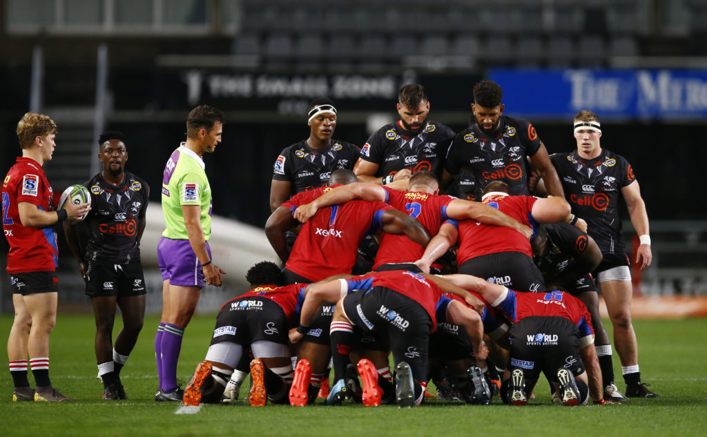 The Sharks prepare to scrum against the Lions