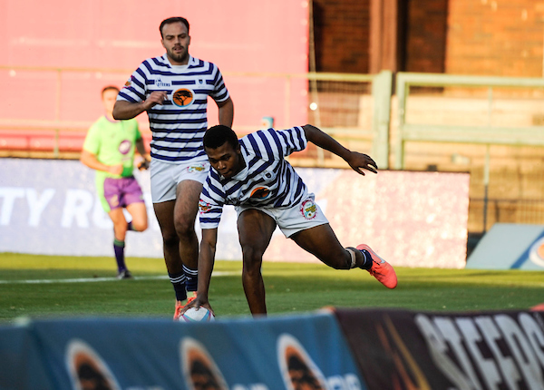 Athi Gazi scores one of his three tries in the Varsity Cup