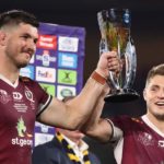 BRISBANE, AUSTRALIA - MAY 08: Liam Wright and James O'Connor of the Reds hold the trophy after winning the Super RugbyAU Final match between the Queensland Reds and the ACT Brumbies at Suncorp Stadium, on May 08, 2021, in Brisbane, Australia. (Photo by Jono Searle/Getty Images)