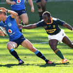 CAPE TOWN, SOUTH AFRICA - JULY 17: Johan Goosen of the Vodacom Bulls moves away from Yaw Penxe during the match between South Africa A and Vodacom Bulls at Cape Town Stadium on July 17, 2021 in Cape Town, South Africa.