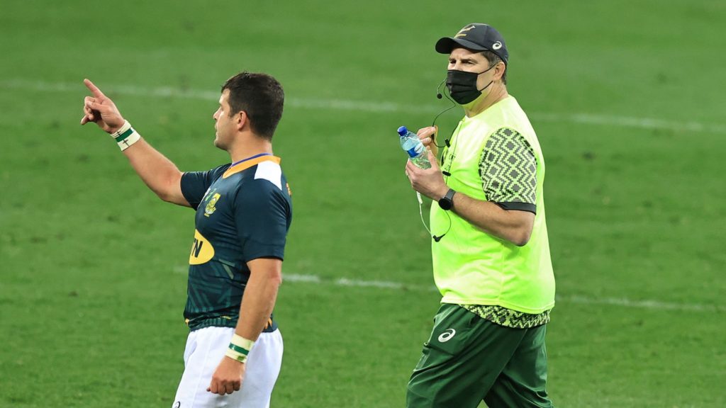 CAPE TOWN, SOUTH AFRICA - JULY 14: Rassie Erasmus, the South Africa Springbok head coach, acts as a water carrier during the match between South Africa A and the British & Irish Lions at Cape Town Stadium on July 14, 2021 in Cape Town, South Africa. (Photo by David Rogers/Getty Images)